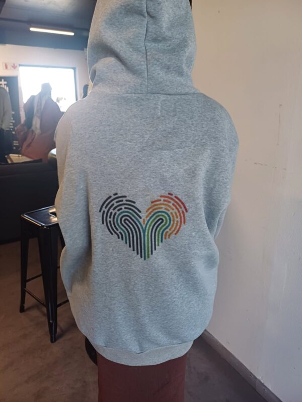 A picture of a hoodie with a heart on it.