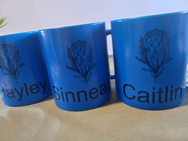 A picture of blue ceramic mugs.